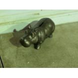 A cast metal hippo piggy bank* This lot is subject to VAT