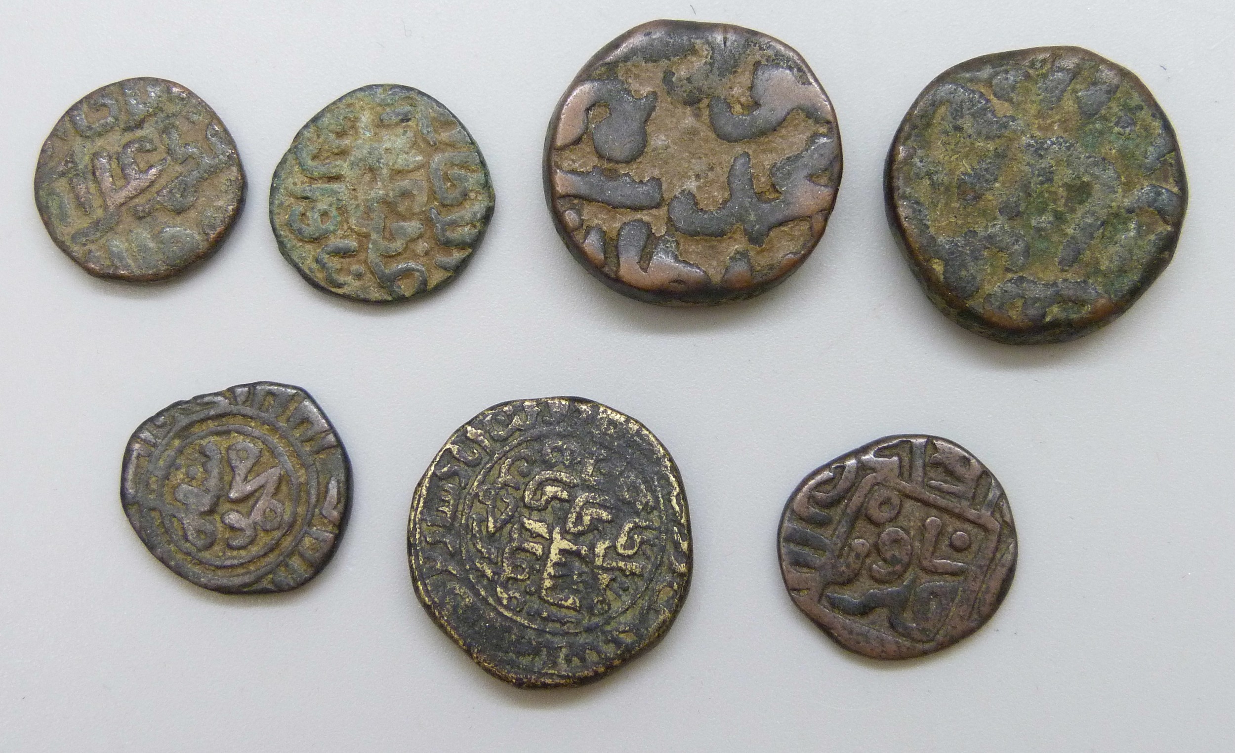 A collection of Eastern coins including bronze