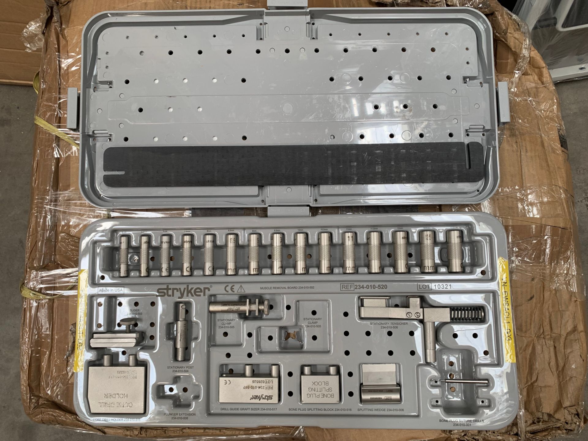 Stryker Muscle Removal Board with various Instruments. Pre-owned, damage to bottom of casing. (Three