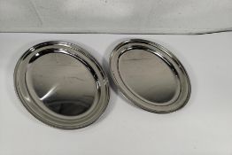 Eighteen as new stainless steel oval dishes, flat - 406mm (x6) and 457mm (x 12) (may show signs of l