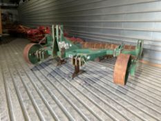 2002 Cousins V-Form 3leg subsoiler with rear packer and depth wheels. Model No: VF27H3TP24. Serial N