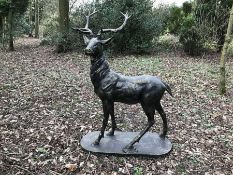 LARGE CAST IRON STAG STANDING ON PLINTH