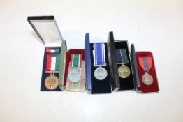 A collection of medals including Police Long Servi