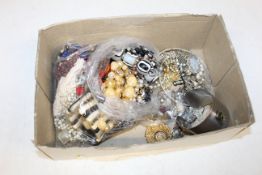 Three boxes of assorted costume jewellery to inclu