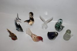 A collection of various glass paperweights (8)
