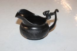A black basalt jug