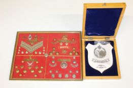 A collection of various insignia to include Arab L