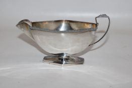 An Art Deco Birmingham silver cream jug, by Ernest