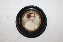 A 19th Century miniature hand painted portrait dep