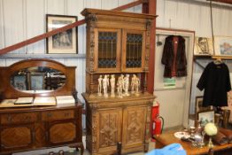 A 19th Century carved oak Flemish style side cabin