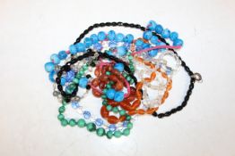 A box containing stone and other bead necklaces