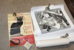 A collection of various rolled posters