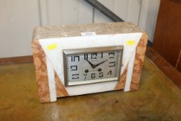 An Art Deco marble twin hole mantel clock