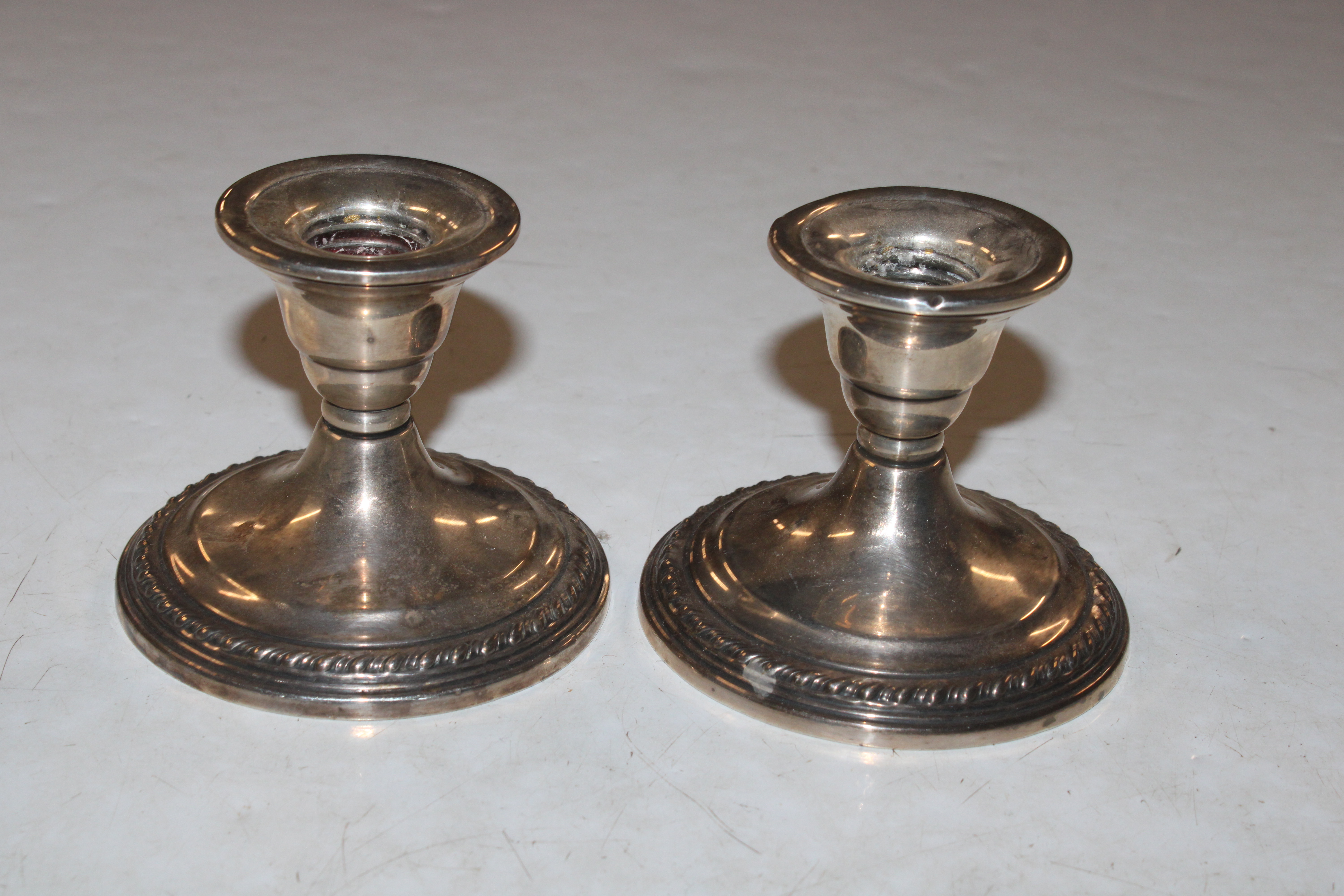 A pair of Sterling silver candlesticks with weight - Image 3 of 29