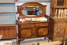 A mahogany mirror backed sideboard fitted two draw