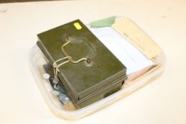 A box containing various mixed coinage to include