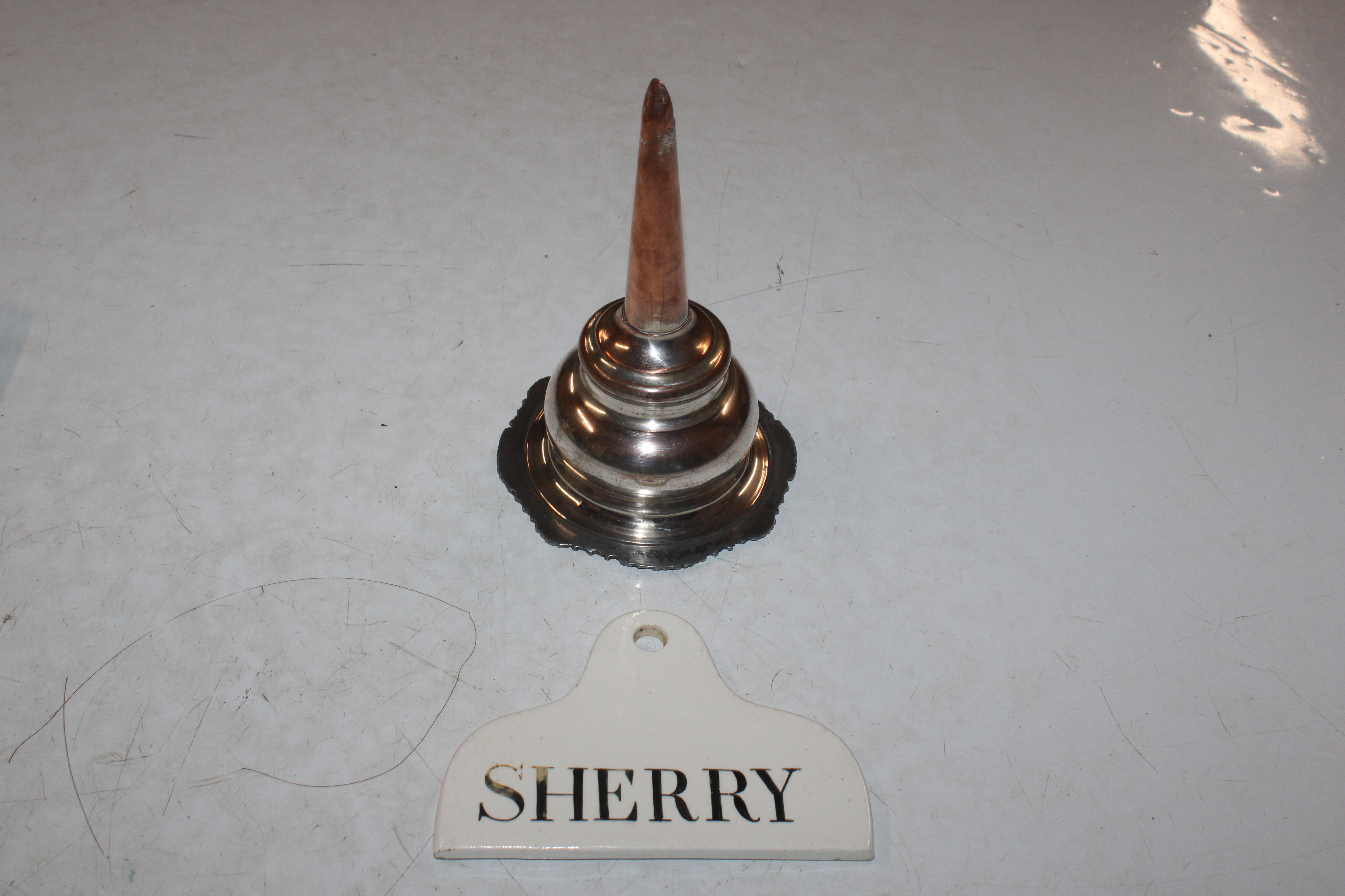 An early 19th Century pottery bin label for Sherry