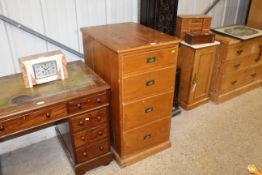 A pine filing chest fitted four graduated drawers