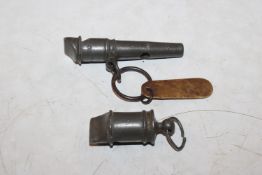 A 19th Century pewter whistle of cannon form and a