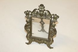An ornate brass photo frame