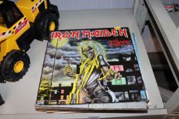 A quantity of various records to include Iron Maid
