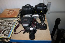 Two Sony camcorders, a Pentax camera and a Sigma c