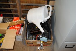 A box containing various items to include plastic