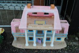 A Little Tikes child's outdoor dolls playhouse