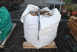 A dumpy bag containing a quantity of various sawn