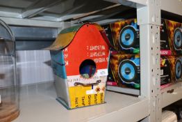 A recycled tin model of a bird house (155)