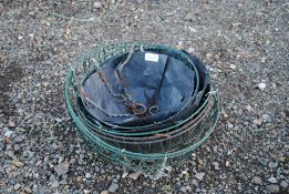 A small quantity of hanging plant baskets