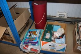 A box containing various collector's dolls and a