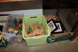 Three boxes containing wooden train track, chess b