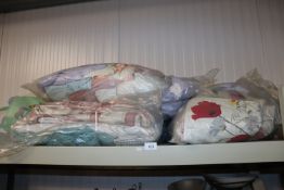 Two bags of various sheets and duvet covers togeth