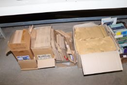 Four boxes containing various size envelopes