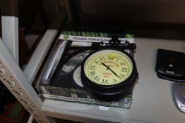 A double sided garden clock