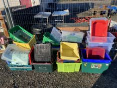 A quantity of plastic crates / storage boxes