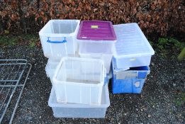 A quantity of plastic storage crates