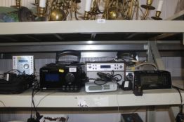 A collection of various radios to include Roberts,