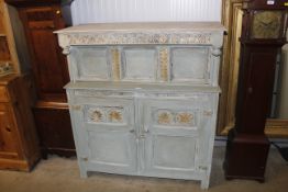 An oak blue painted court cupboard