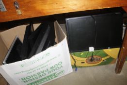 Two boxes containing computer monitors, most lacki