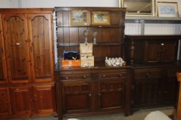 An Old Charm style dresser raised on cupboard base