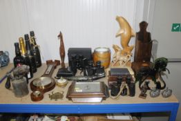 A collection of wooden items to include biscuit ba