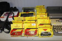A collection of sports car die cast vehicles