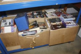Five boxes containing DVDs, books and records