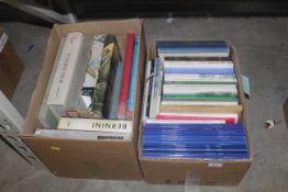 Two boxes containing books to include Italian art reference works, history of religious buildings