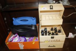 A box containing essential oils together with a bo