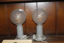 A pair of table lamps