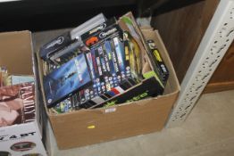 Two boxes of DVDs