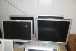 Three Phillips monitors together with one other